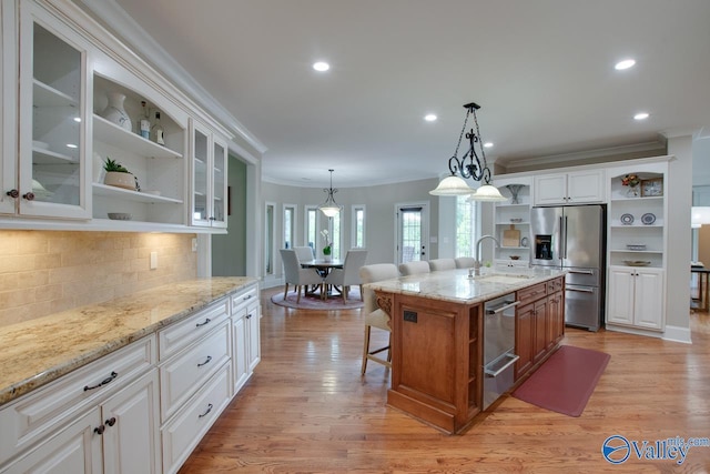 2833 High Mountain Rd NE, Huntsville, AL 35811 - kitchen with appliances with stainless steel finishes, open shelves, a sink, ornamental molding, and white cabinetry