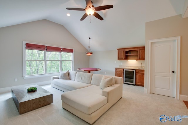 2833 High Mountain Rd NE, Huntsville, AL 35811 - living room with beverage cooler, wet bar, a ceiling fan, and lofted ceiling