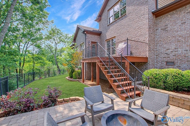 2833 High Mountain Rd NE, Huntsville, AL 35811 - view of patio / terrace with a fenced backyard, stairs, a fire pit, and a wooden deck