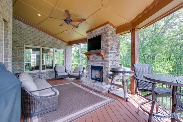 2833 High Mountain Rd NE, Huntsville, AL 35811 - wooden deck featuring an outdoor living space with a fireplace and ceiling fan