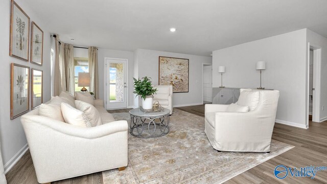 403 Jackson Point Cir, Huntsville, AL 35811 - living area featuring wood finished floors and baseboards