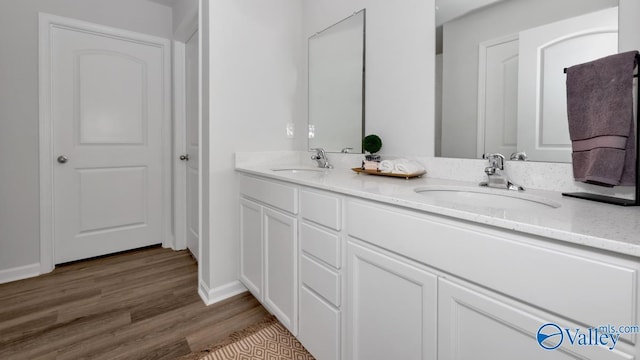 403 Jackson Point Cir, Huntsville, AL 35811 - full bathroom featuring double vanity and wood finished floors