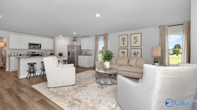 403 Jackson Point Cir, Huntsville, AL 35811 - living room featuring wood finished floors and recessed lighting