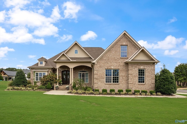 view of front of home with a front lawn