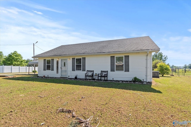 26150 Mooresville Rd, Elkmont, AL 35620 - ranch-style house featuring fence and a front lawn
