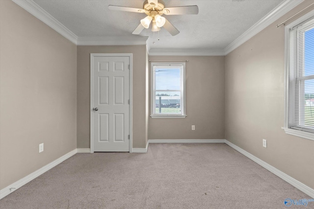 26150 Mooresville Rd, Elkmont, AL 35620 - unfurnished room with carpet floors, crown molding, baseboards, and ceiling fan