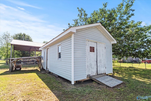 26150 Mooresville Rd, Elkmont, AL 35620 - view of shed featuring fence