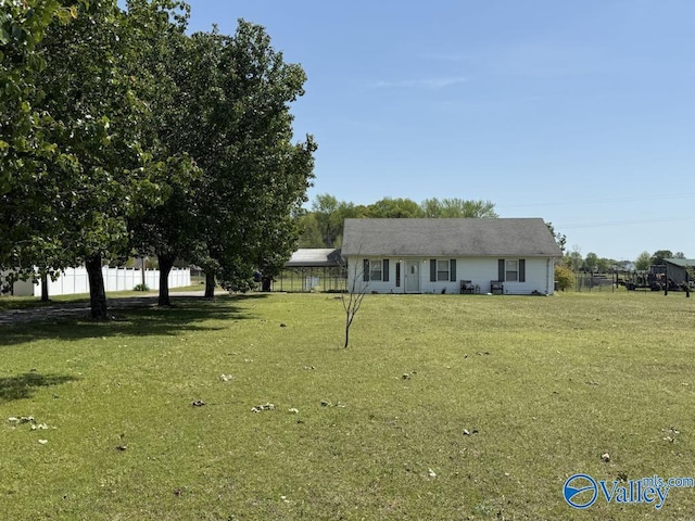 26150 Mooresville Rd, Elkmont, AL 35620 - view of front facade with fence and a front yard