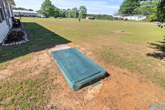26150 Mooresville Rd, Elkmont, AL 35620 - entry to storm shelter with a lawn