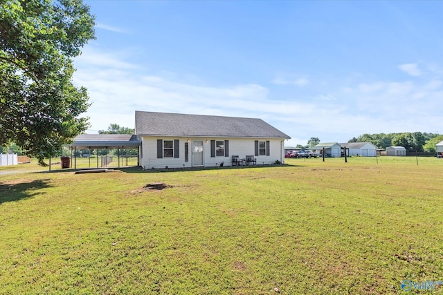 26150 Mooresville Rd, Elkmont, AL 35620 - view of front of home featuring a front lawn and a carport