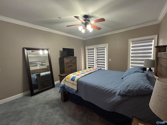 bedroom featuring ornamental molding, a textured ceiling, ceiling fan, and carpet