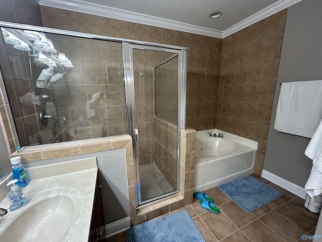 full bathroom featuring a garden tub, tile patterned flooring, crown molding, vanity, and a shower stall