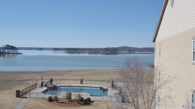 water view featuring a fenced backyard