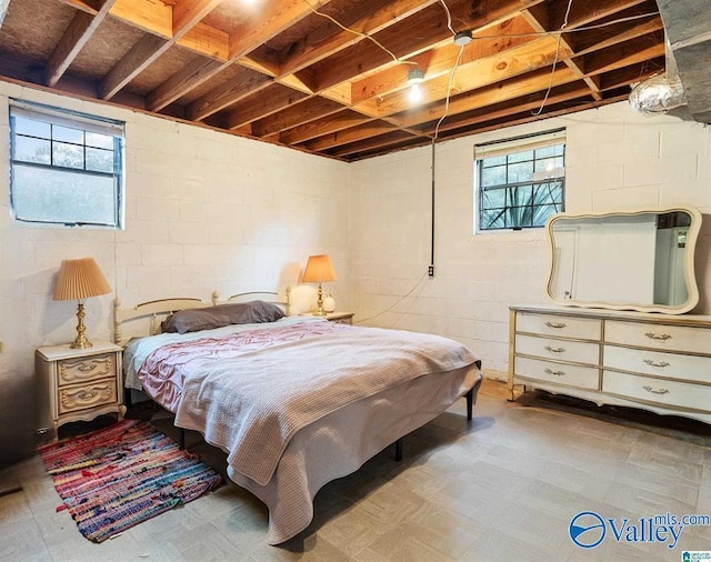 bedroom featuring multiple windows