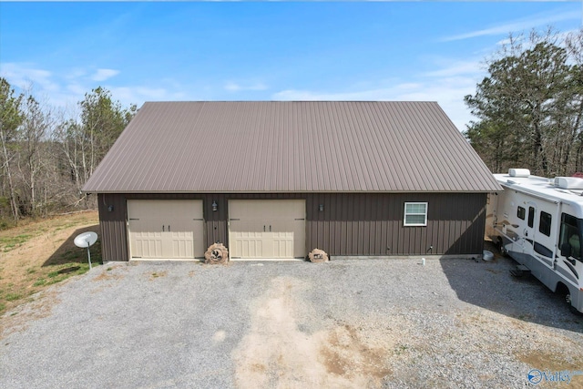 garage featuring driveway