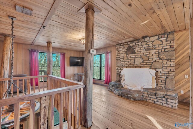 136 Higdon Rd, Falkville, AL 35622 - unfurnished bedroom with wood ceiling, carpet, wooden walls, and ensuite bath