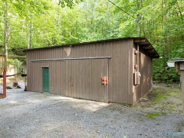 136 Higdon Rd, Falkville, AL 35622 - view of outdoor structure featuring a wooded view