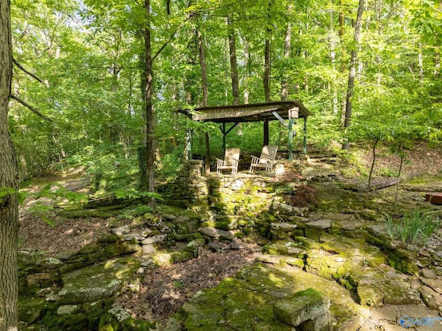 136 Higdon Rd, Falkville, AL 35622 - view of yard featuring a wooded view