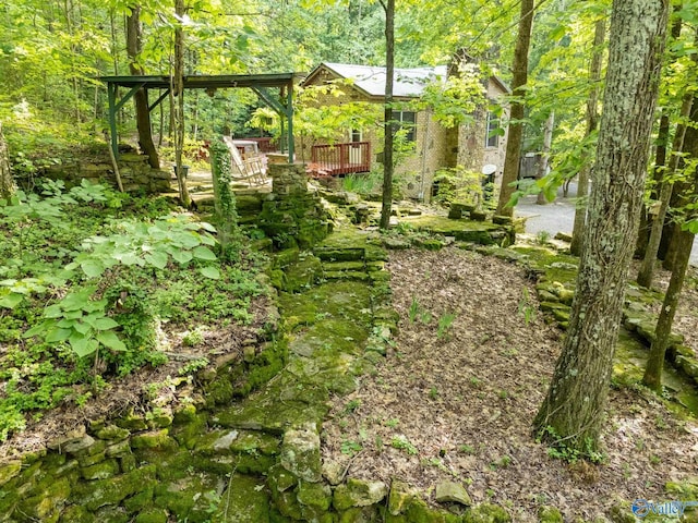 136 Higdon Rd, Falkville, AL 35622 - view of yard featuring a wooden deck
