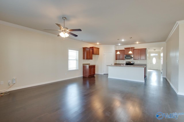 unfurnished living room featuring ceiling fan, crown molding, and dark hardwood / wood-style floors