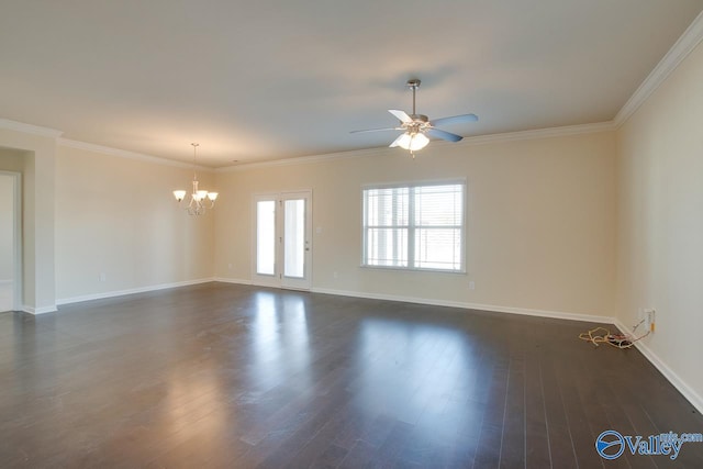 empty room with ceiling fan with notable chandelier, dark hardwood / wood-style floors, and crown molding