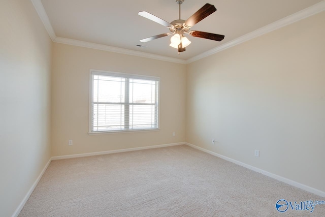 empty room with light carpet, ceiling fan, and ornamental molding