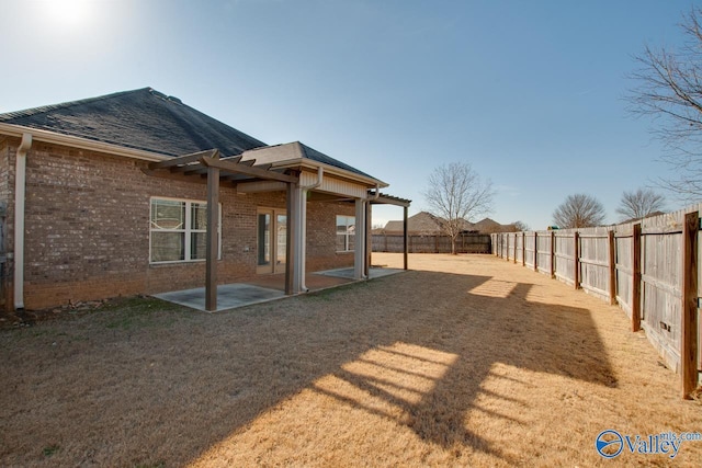 back of house with a patio area