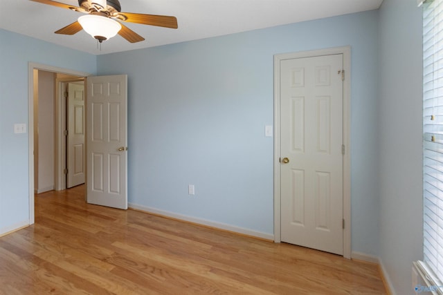 209 Leslie Ln, Harvest, AL 35749 - empty room featuring light wood-type flooring, ceiling fan, and healthy amount of natural light