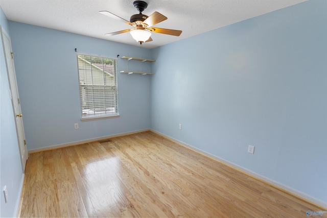 209 Leslie Ln, Harvest, AL 35749 - unfurnished room featuring light wood-style flooring and ceiling fan