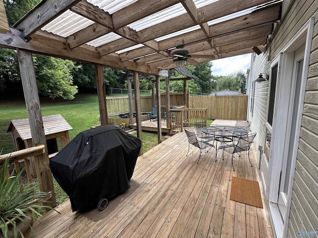 209 Leslie Ln, Harvest, AL 35749 - wooden deck with a grill, outdoor dining space, and ceiling fan