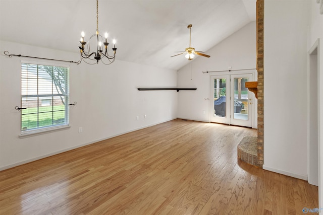 209 Leslie Ln, Harvest, AL 35749 - spare room featuring ceiling fan, light wood-style floors, high vaulted ceiling, a chandelier, and french doors