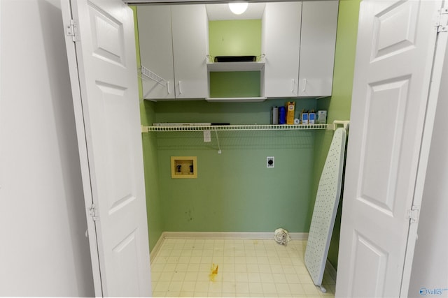 209 Leslie Ln, Harvest, AL 35749 - washroom with electric dryer hookup, cabinet space, and hookup for a washing machine