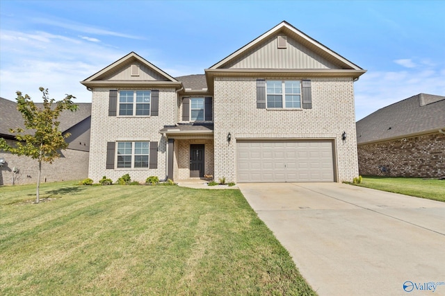 view of front of home with a garage and a front lawn