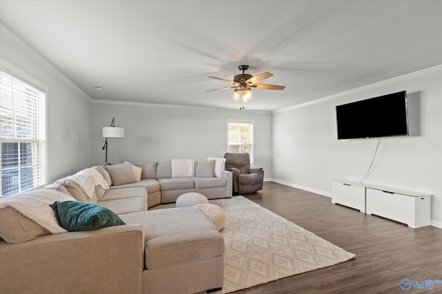 living room with ornamental molding, dark hardwood / wood-style flooring, and ceiling fan