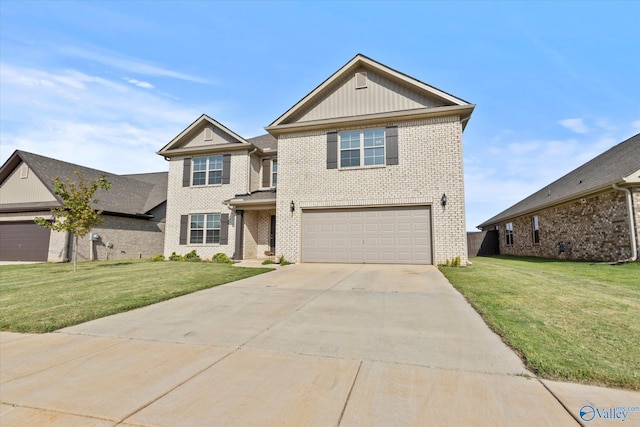 view of front of house featuring a garage and a front lawn