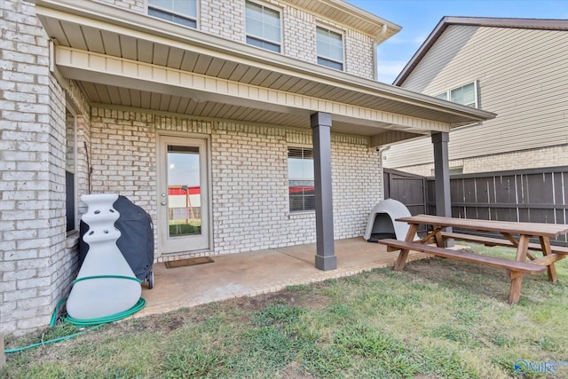 rear view of house with a patio