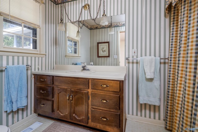 bathroom featuring vanity and tile patterned flooring