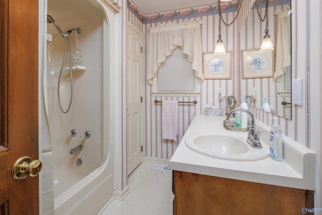 bathroom with vanity, shower / washtub combination, and tile patterned flooring