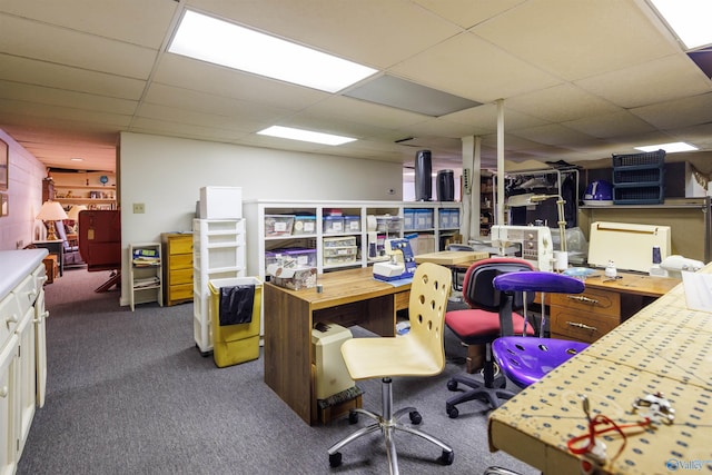 office featuring a drop ceiling and dark carpet