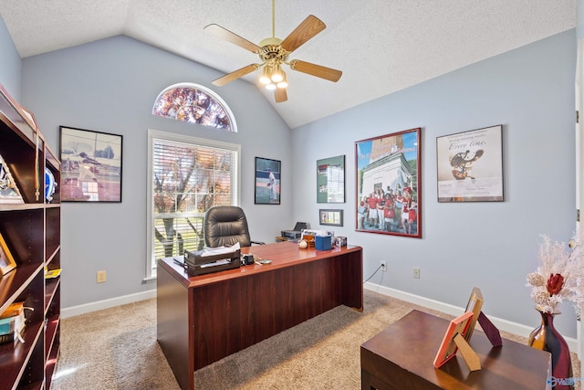 home office with ceiling fan, light colored carpet, lofted ceiling, and a textured ceiling