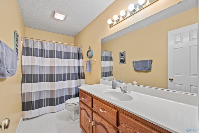 bathroom with toilet, a textured ceiling, vanity, curtained shower, and tile patterned flooring