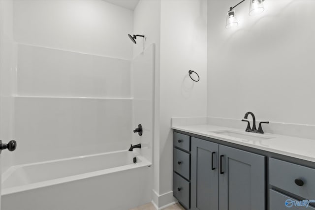 bathroom featuring vanity and tub / shower combination