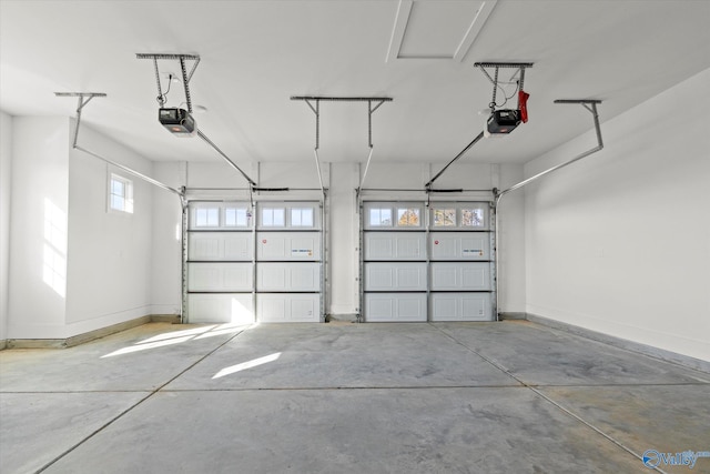 garage featuring a garage door opener