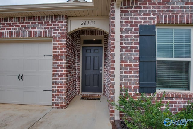 entrance to property featuring a garage