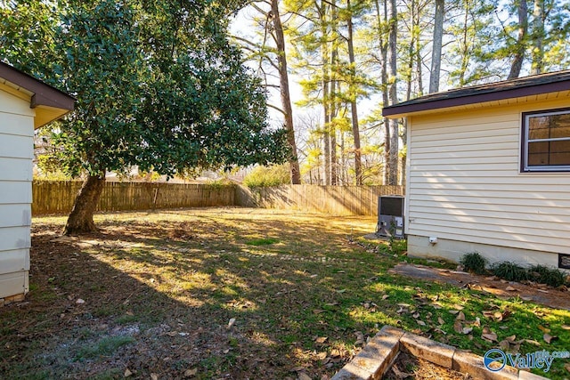 view of yard featuring central AC unit