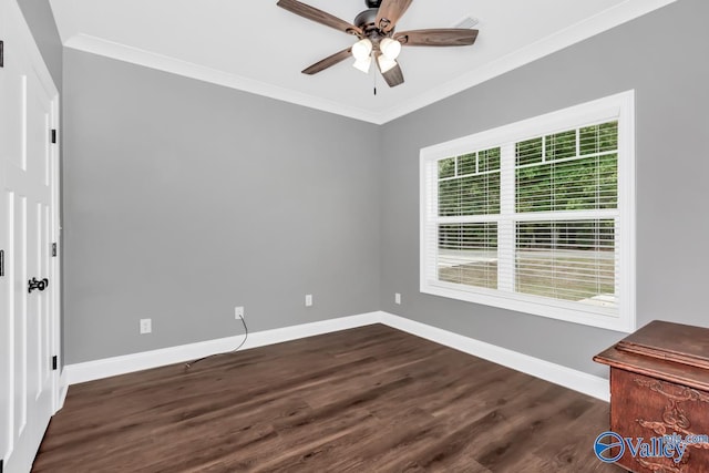 empty room featuring a ceiling fan, baseboards, dark wood-style flooring, and crown molding