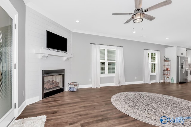 living room with a fireplace, recessed lighting, dark wood-type flooring, a ceiling fan, and baseboards