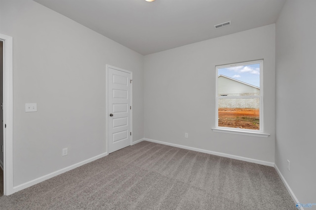 view of carpeted spare room