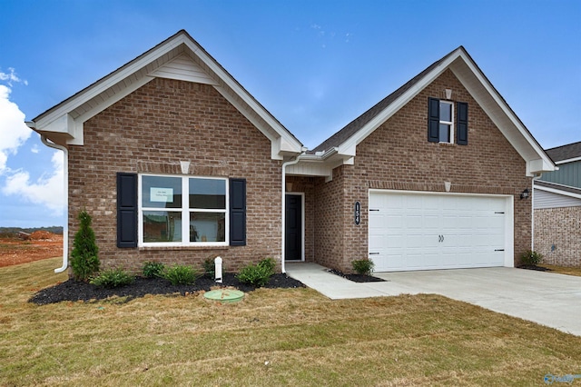 view of front facade with a garage and a front yard