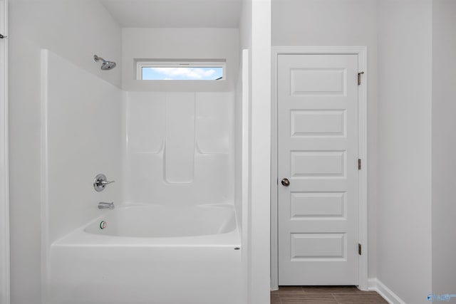 bathroom with shower / bath combination